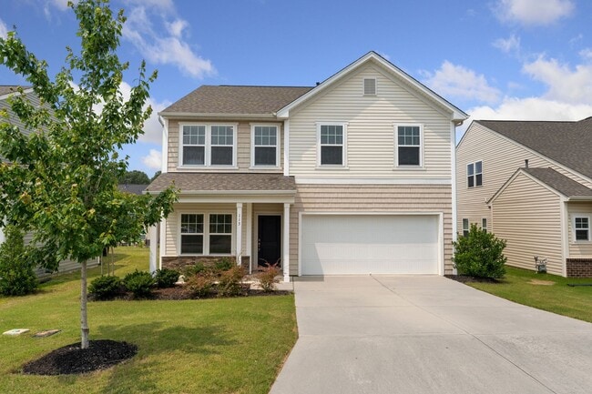 Building Photo - Charming and Spacious 4-Bedroom Home with Two Car Garage, located in Morrisville!