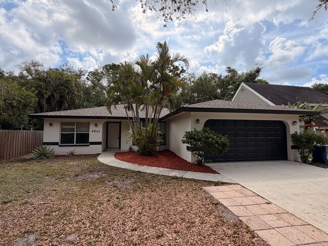 Building Photo - Centrally located 3/2 with 2 car garage. Pet friendly with fenced in backyard. Lawncare included.