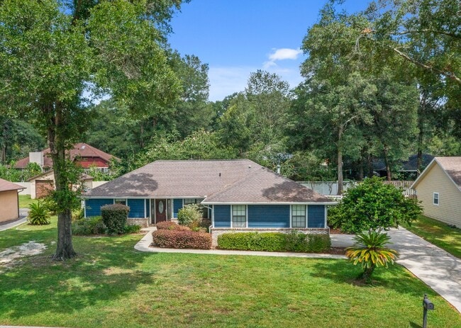 Photo - **Available February 2026***Welcome Home :: 3/2 with oversized fenced backyard in Indian Pines!