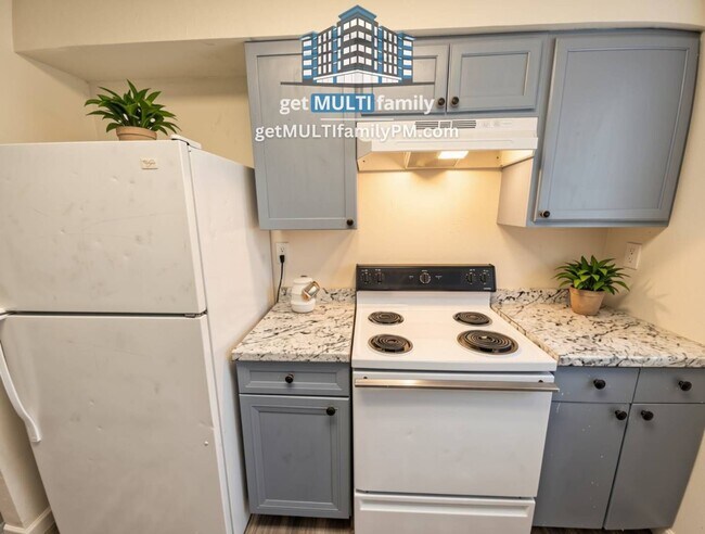 Building Photo - 7120 N 66th Dr Unit 202