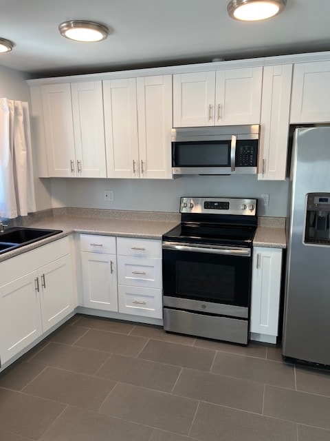 Kitchen Sink, Faucet, Cabinets, Hardware, Stainless Steel Appliances - 4444 E Belleview St Townhome
