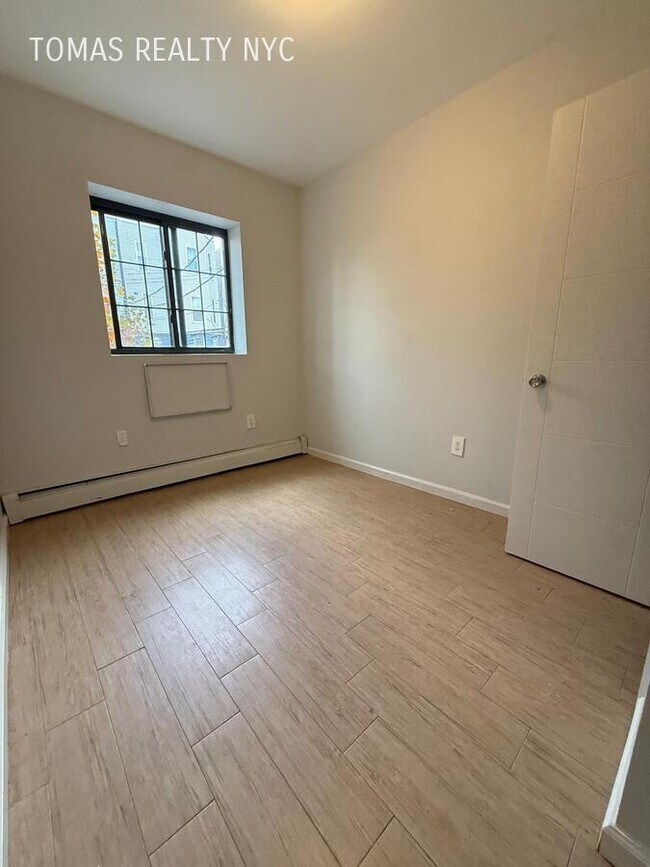 Photo - 727 E 181st St Unit 2