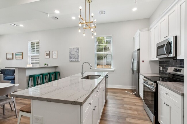 Photo - 4 Bed 3 Bath unit featuring a wet bar!! Unit 1A
