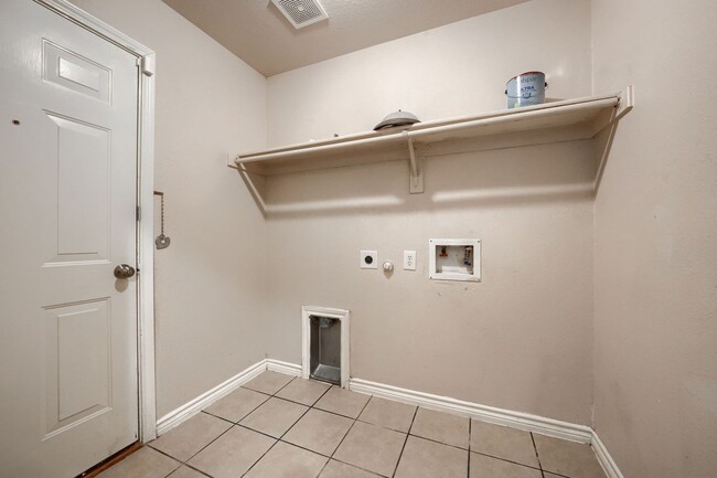 Photo - Stunning 6-Bedroom Home with Spacious Backyard and Modern Upgrades