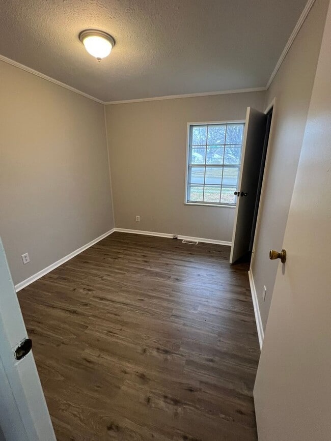 Photo - Four Bedrooms So Everyone Can Finally Have Their Own Door to Slam!