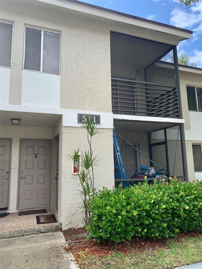 Building Photo - 511 Gardens Dr Unit 204
