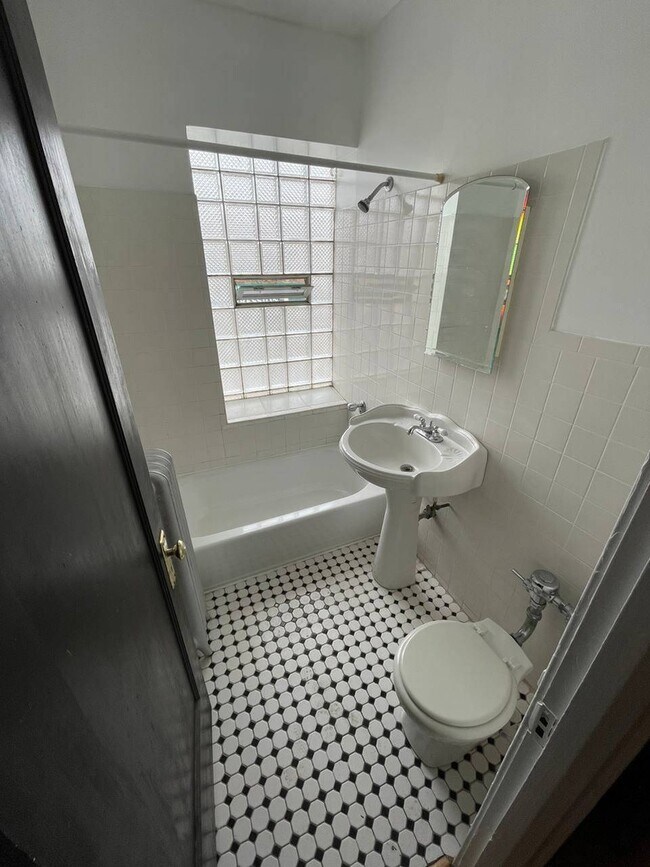 Newly Renovated Bathroom - 7908 S Prairie Ave