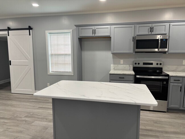 Photo - Fully renovated 3 bedroom 2 bathroom house! Lawn Care Included