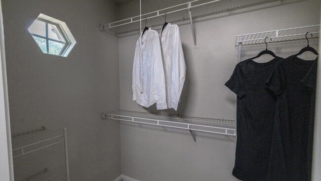 Live the dream with the master suite's walk-in closet, a treasure trove of space and organized elegance.