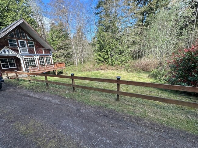 Building Photo - Adorable Chalet Style 4 Bedroom House in Serene Setting!
