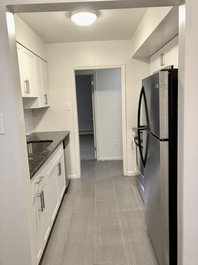 1 Bedroom Kitchen - Spruce Court Apartments
