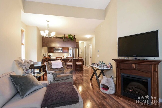 Photo - Exceptional Condo Living in the Heart of Maple Ridge — 1 Bed Plus Den / 1 Bath Corner Unit at Wel... Unit 406