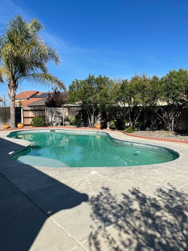 Photo - Luxury 3 Bed / 2 Bath Home with Pool and Solar Panels – Available 4/1/2026