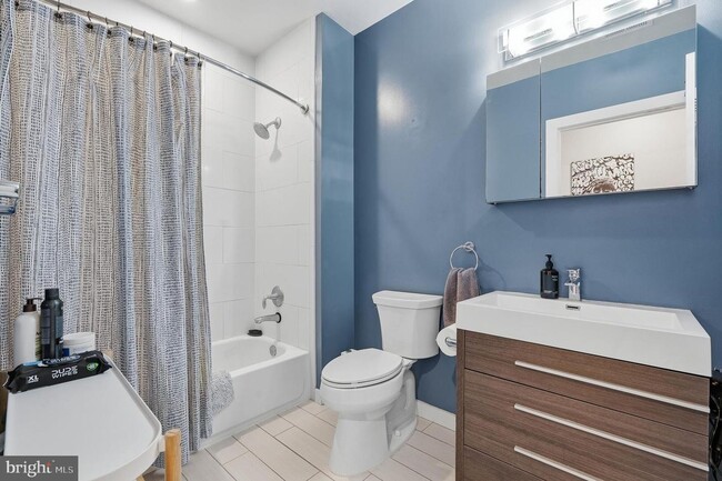Photo - Live in one of DC's most vibrant neighborhoods from this sun-filled 1BR | 1BA condo