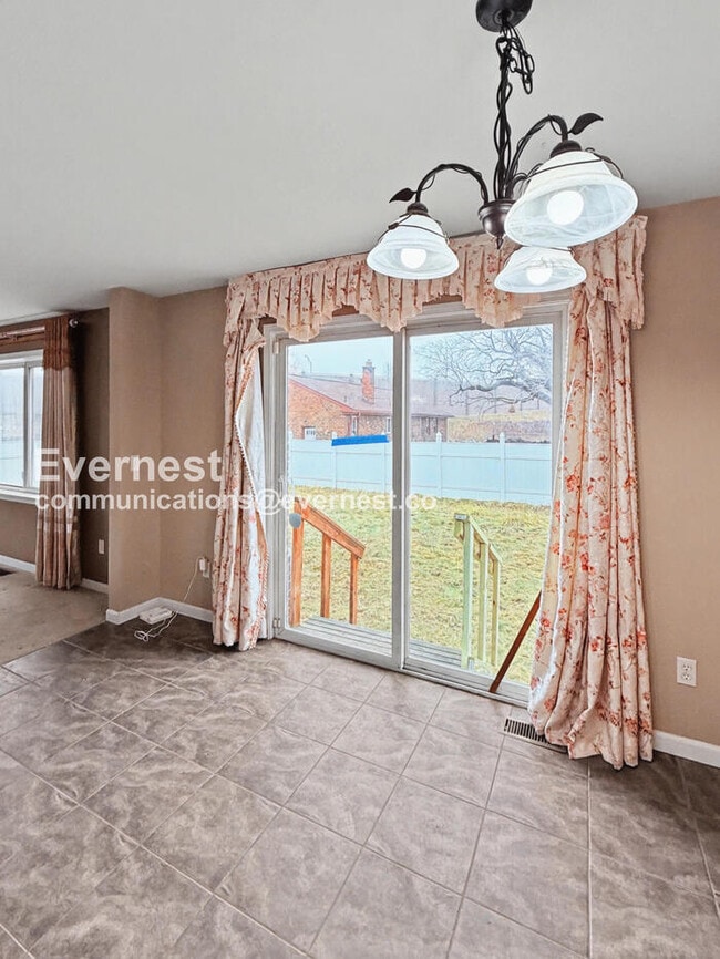 Photo - Spacious 3 Bed, 2.5 Bath Home with Fenced Yard and Attached Garage