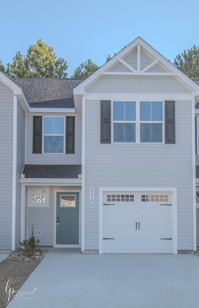 Building Photo - Modern 3-Bedroom Townhome Unit D