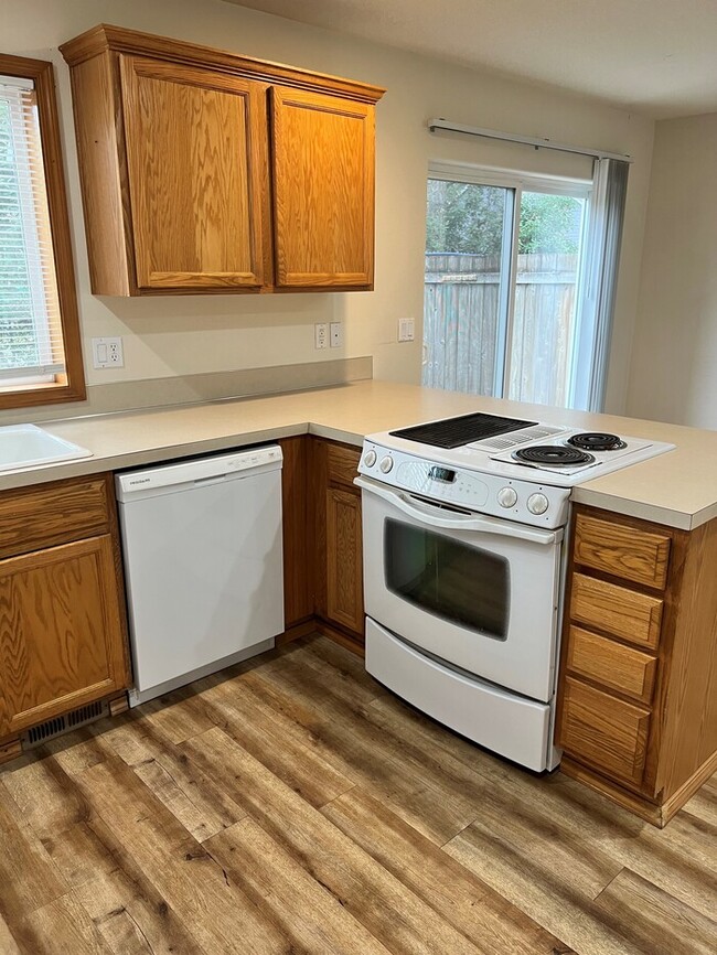 Photo - Beautiful Home with LVP Flooring, W/D, Garage, Back Yard, and MORE!