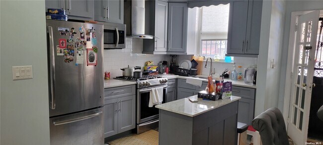 Photo - 32-54-54 78th St Townhome
