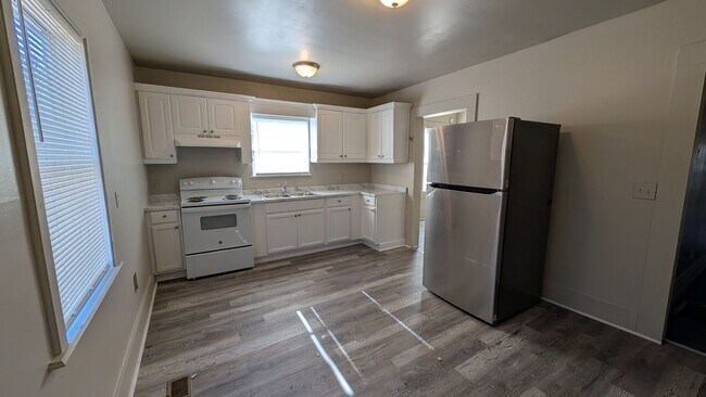 Photo - 3BR/1BA -- Deck, Separate Dining Room, In-Unit Laundry