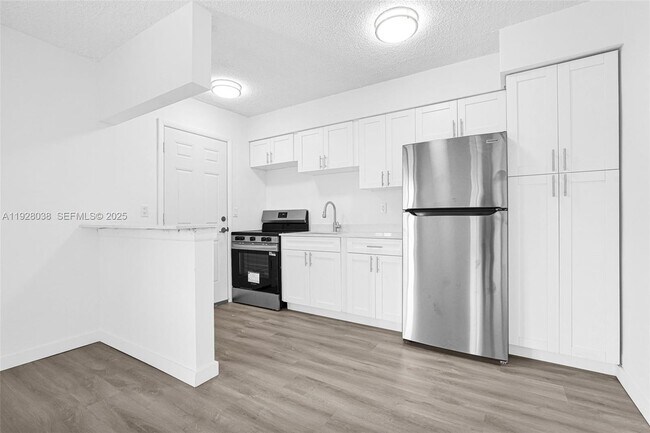 Building Photo - 13210 Memorial Hwy Unit 221