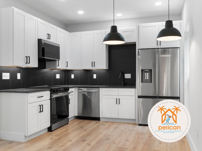 Photo - Striking 2BR / 2BA Home with Soaring Vaulted Ceilings