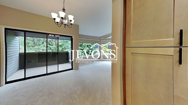 Photo - Top-floor 2-level condo with brand-new kit...