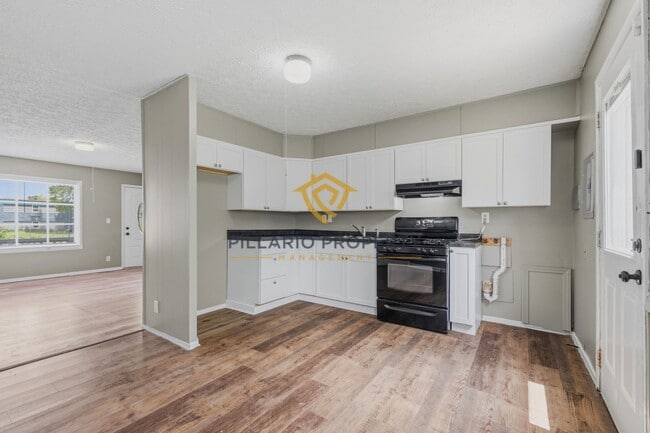 Photo - Charming 3-Bedroom Near Downtown with Fenced Yard & Garage Available NOW!