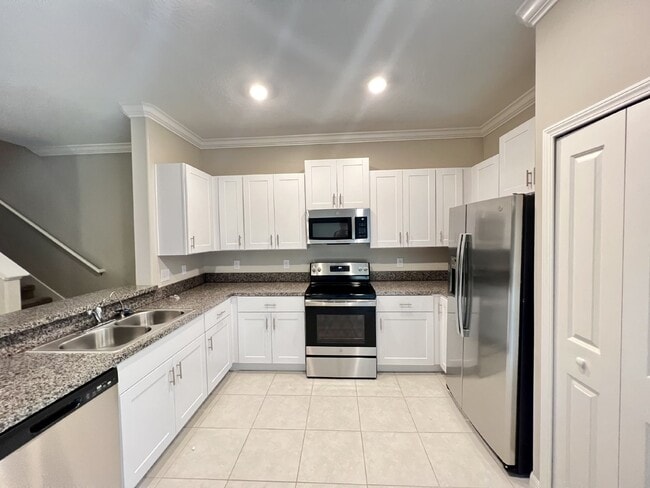 Photo - "Charming 3-Bed townhouse with Granite Accents, 2.5 Baths, 1650 Sq Ft – New Flooring and New Paint