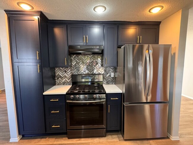 Building Photo - REMODELED Home Featuring LVP Flooring Thro...
