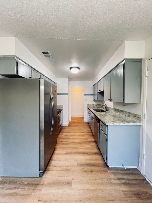 Building Photo - WELCOME TO YOUR NEXT CHAPTER IN FRESNO!