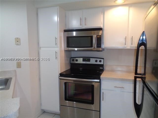 Building Photo - 3380 Pinewalk Dr N Unit 1116