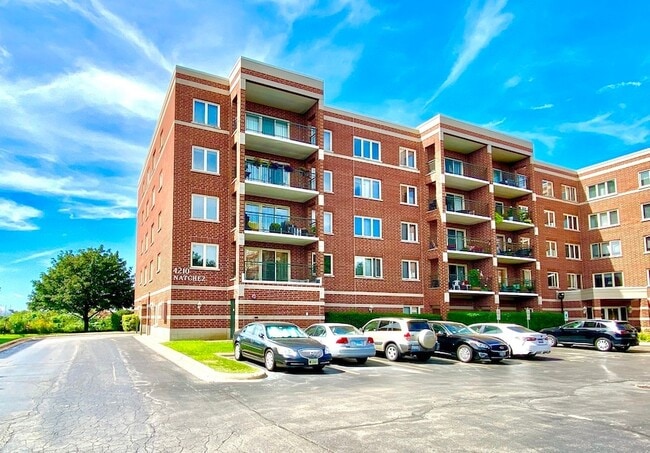 Building Photo - 4210 N Natchez Ave Unit 410