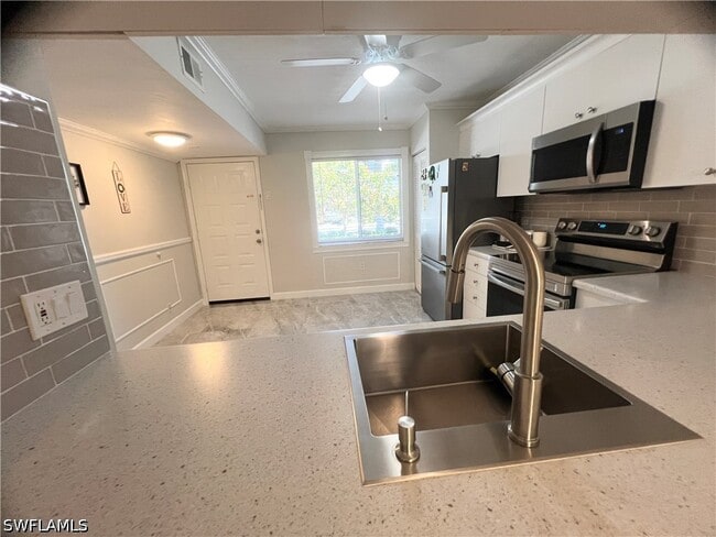Photo - 3011 Sandpiper Bay Cir Unit C102