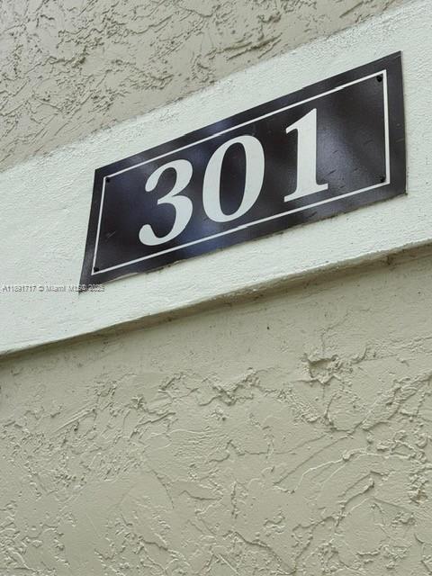 Building Photo - 301 Gardens Dr Unit 203