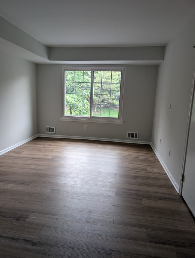 Bedroom w/ new flooring