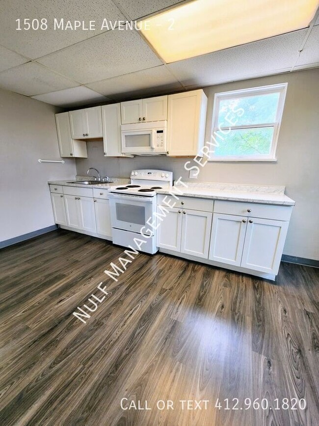 Building Photo - 1508 Maple Ave Unit 2