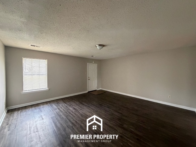 Photo - Move-In Ready 3BR Home in Raleigh | Hardwood Floors, Formal Dining & Fenced Yard