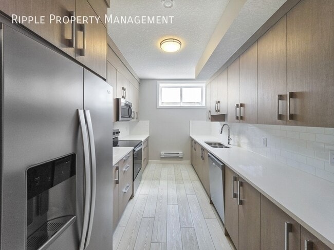 Photo - MODERN & COZY 1-BED, 1-BATH BASEMENT SUITE | PRIVATE ENTRY & IN-SUITE LAUNDRY