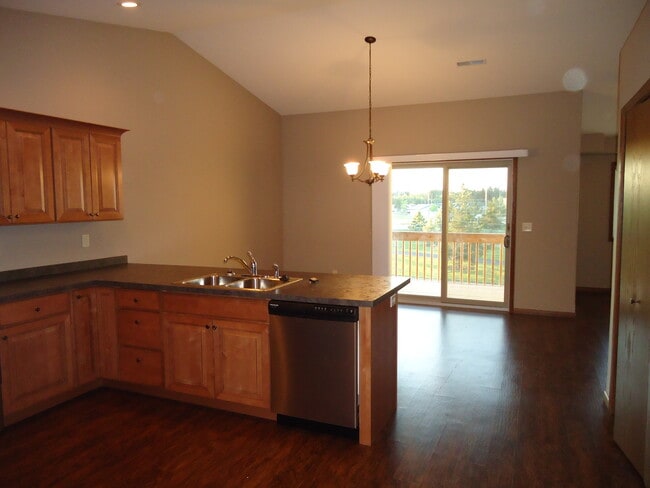 Dinning area Patio looking to Rec Center and Mustang Baseball Fields - 1868 8th Street West Unit Apt. C