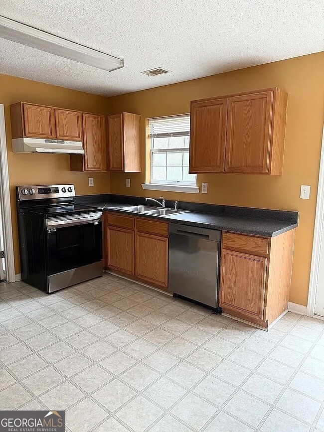 Photo - 1202 Pinedale Cir NW