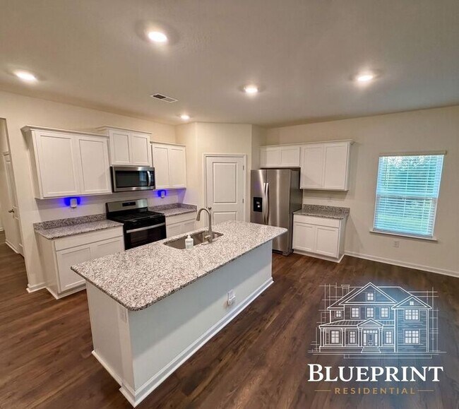 Photo - Single story living 2025 build with custom layout and many upgrades! Private backyard! Available ...