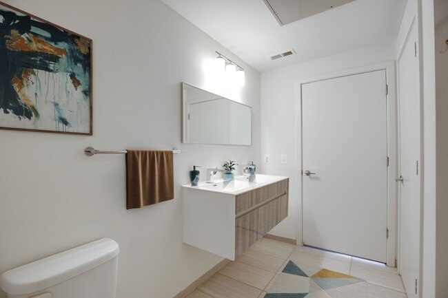 Two-bedroom bathroom (virtually staged)