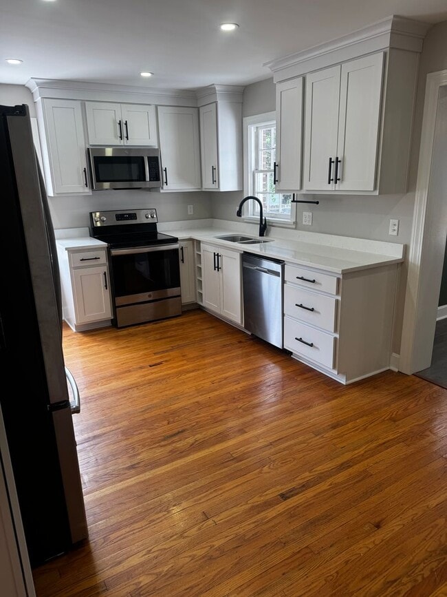 Photo - Fully Updated 3BR/2BA St. Matthews Cape Cod with Garage & Wrap-Around Deck