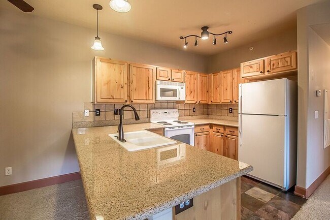 Photo - 6670 N Spurwing Loop Unidad 203