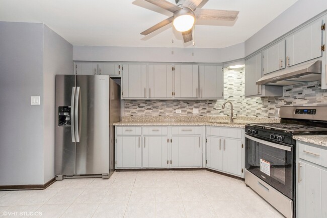 Photo - 7755 S Roberts Rd Condo Unit 5