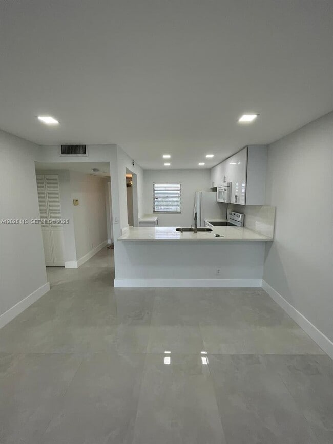 Building Photo - 9460 Tangerine Pl Unit 404