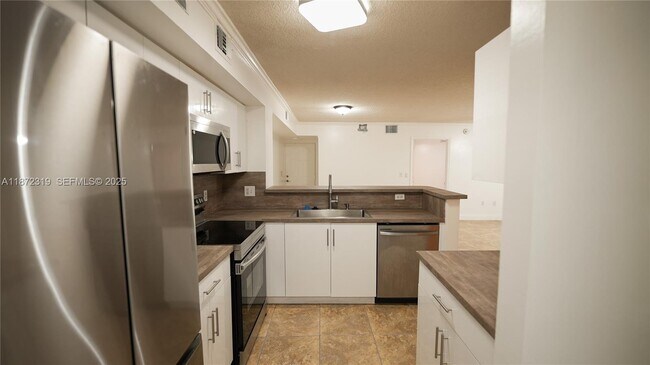 Building Photo - 2123 Renaissance Blvd Unit 105