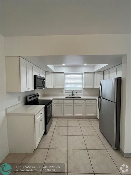 Building Photo - 1017 NW 30th Ct Unit 6 Rental