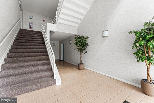 Building Photo - 8001 Greenspring Way Unit 8001-F