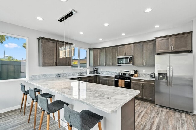 Building Photo - Coastal 3-Bedroom 2-Bathroom House with Hu...
